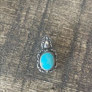 Genuine turquoise pendant stamped